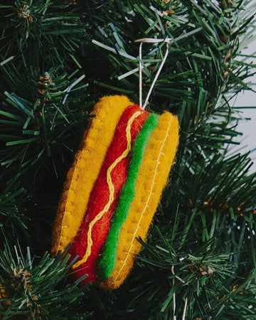 hot dog with bun and mustard wool felt ornament in tree