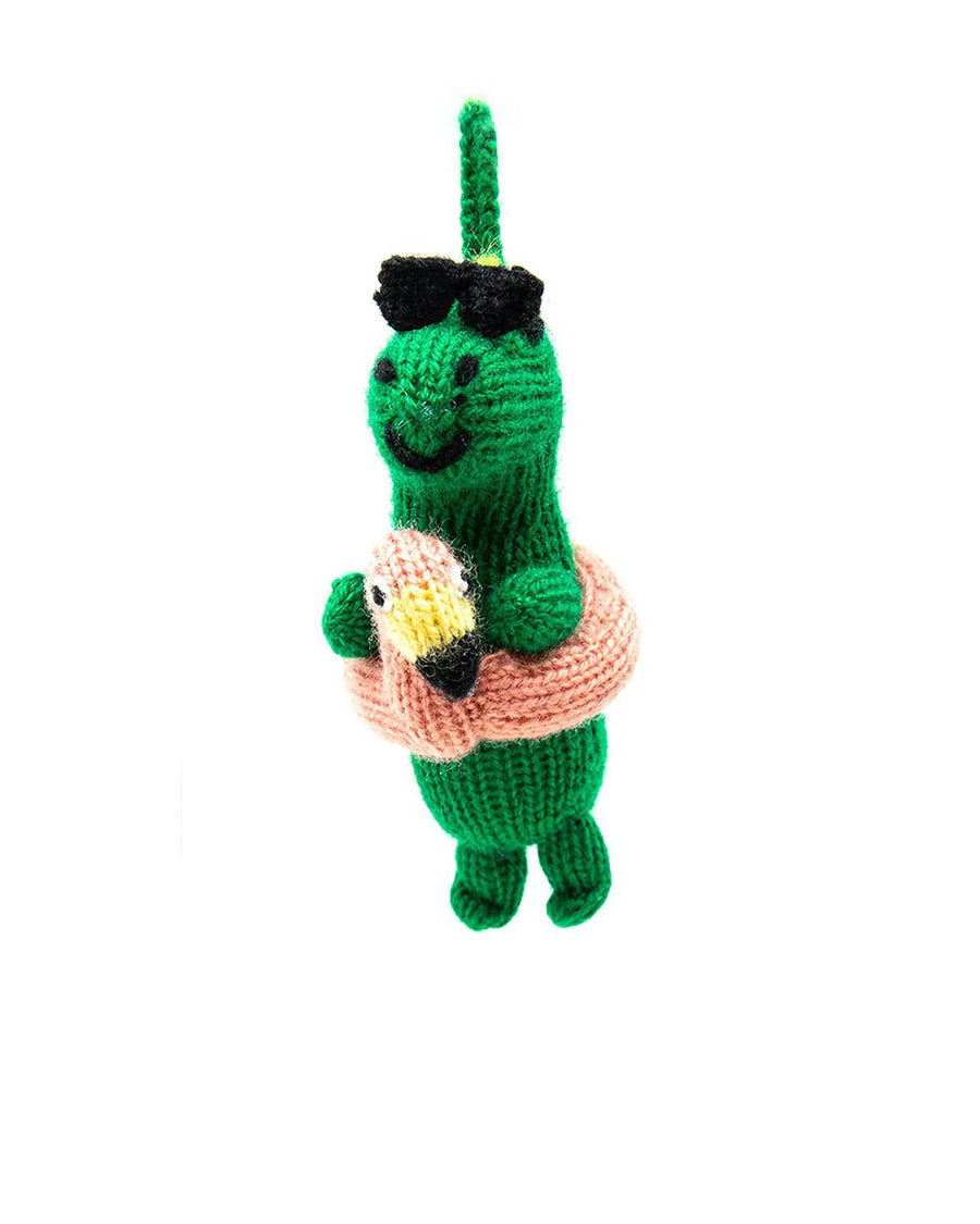 knit dinosaur with sunglasses and pink flamingo inner tube ornament