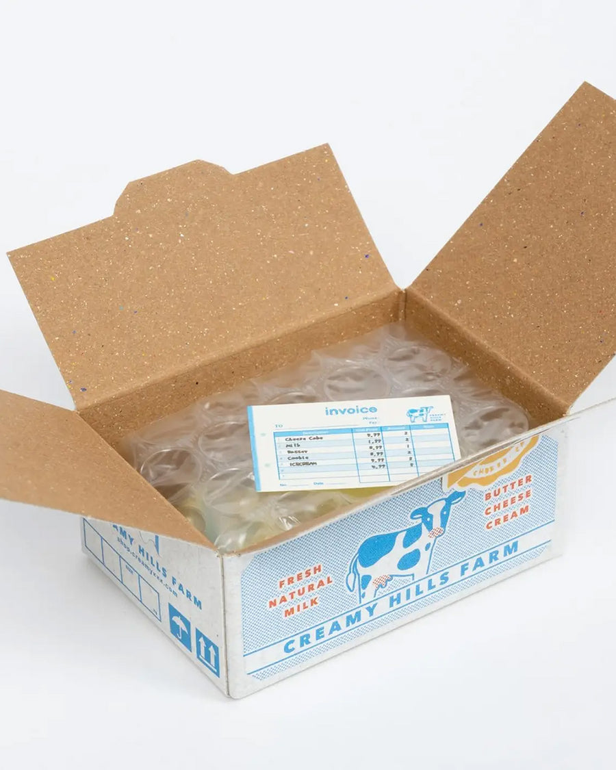 opened box of 40 milk themed holographic stickers