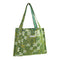 green quilted tote bag with white floral print and teal interior