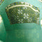 teal interior of green quilted tote bag with white floral print