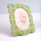 mint fabric scalloped picture frame with peach and white flowers