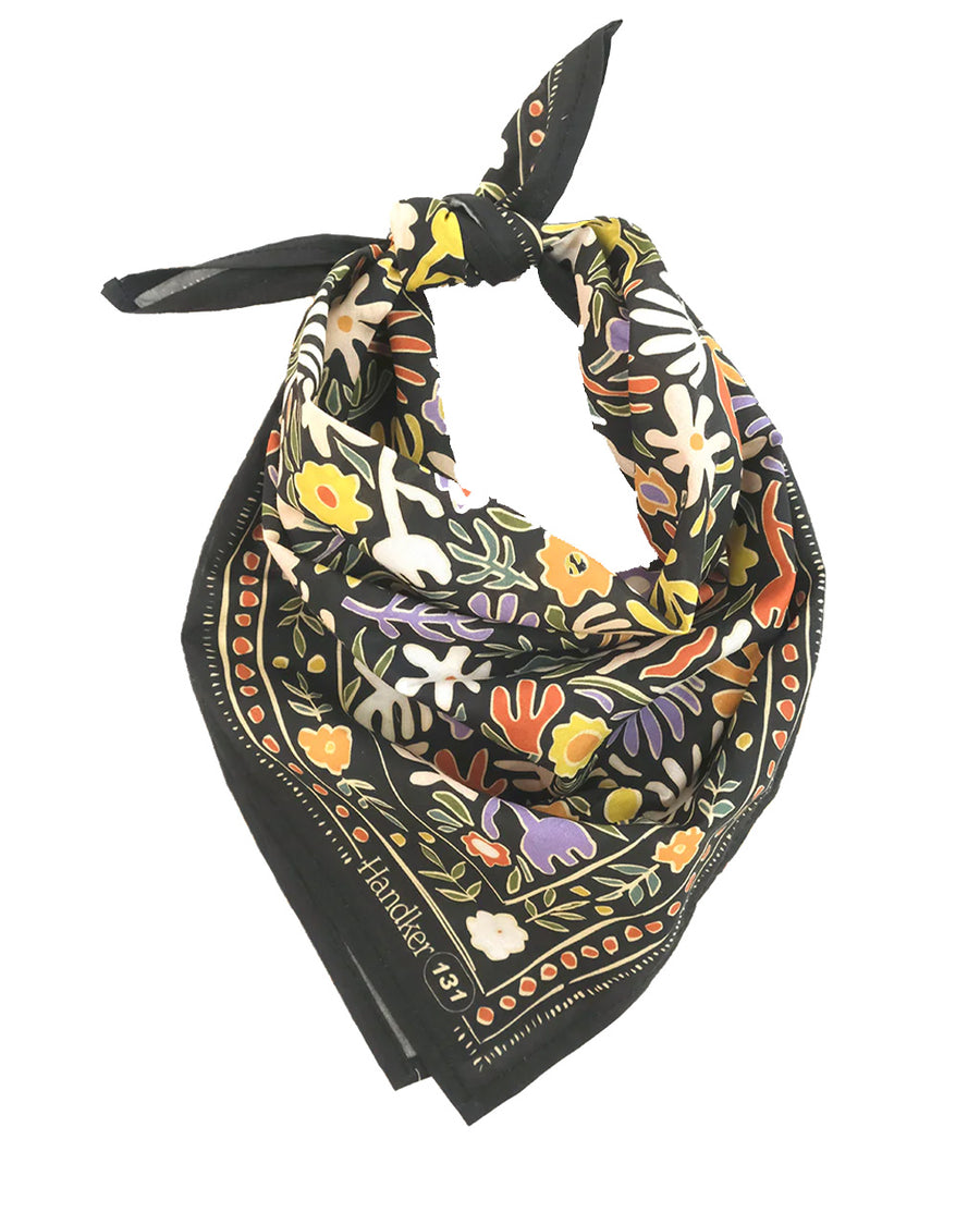 folded and tied black square cotton bandana with colorful abstract floral print