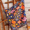 hanging navy bandana with colorful chicken print 