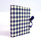 blue and cream gingham fabric folio frame with blue velvet ribbon