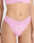 model wearing pink and orange leopard lace thong