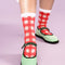 model wearing sheer crew socks with red and white plaid pattern
