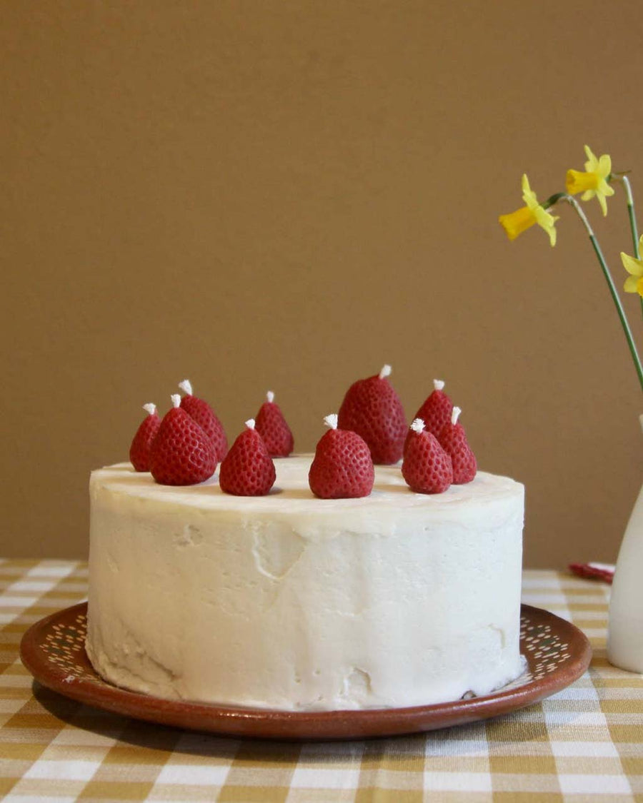set of 10 strawberry shapes birthday candles on cake