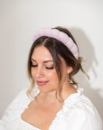 model wearing lavender puff spa headband