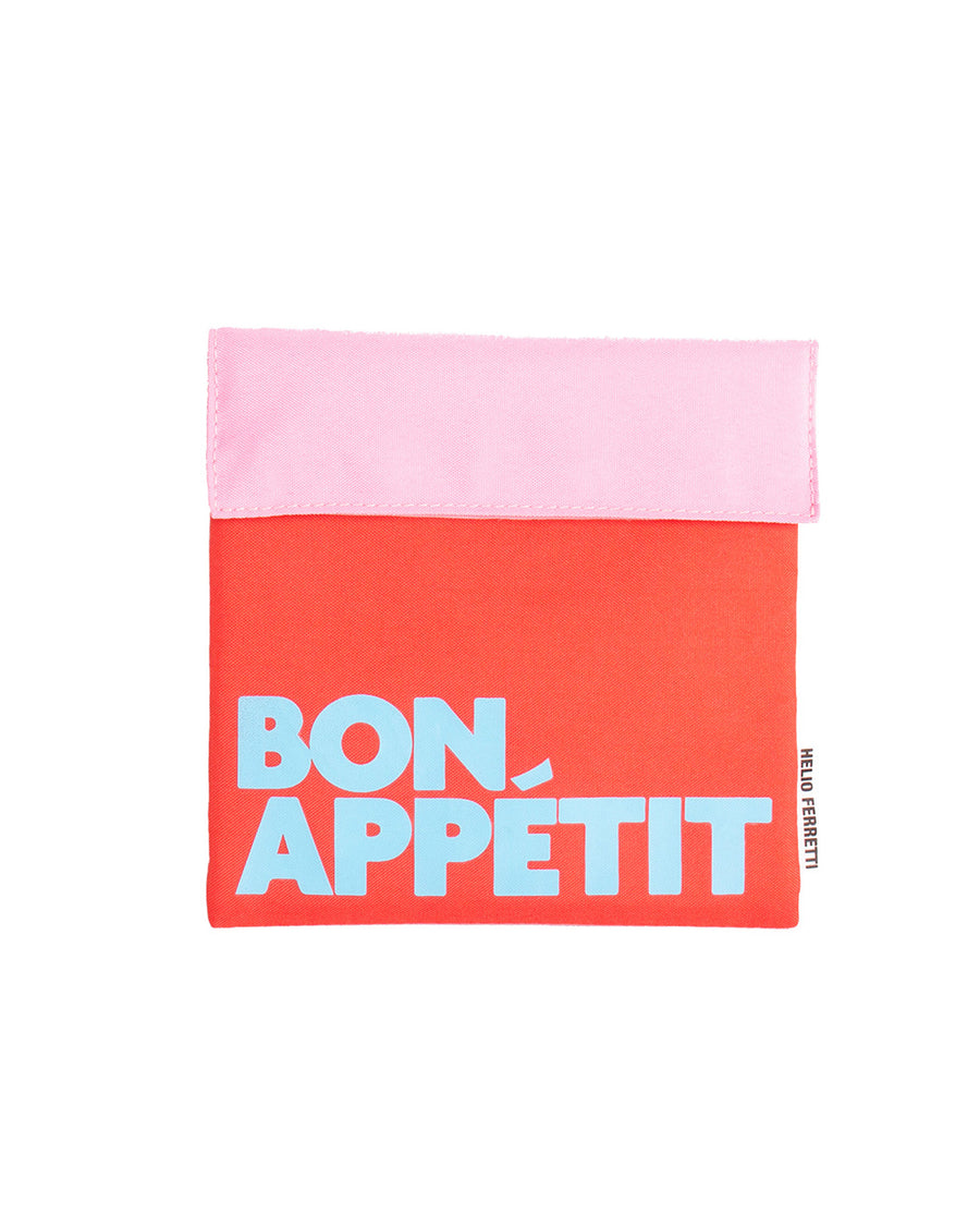 pink and coral snack bag with light blue 'bon appetit' across the front