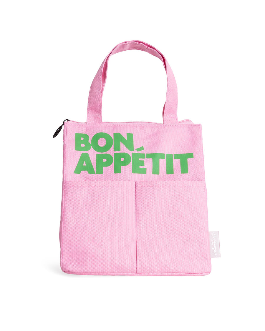 light pink lunch bag with lime green 'bon appetit' across the front