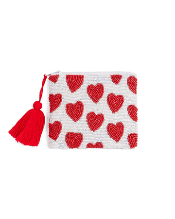 white small beaded clutch with red tassel and red beaded heart design