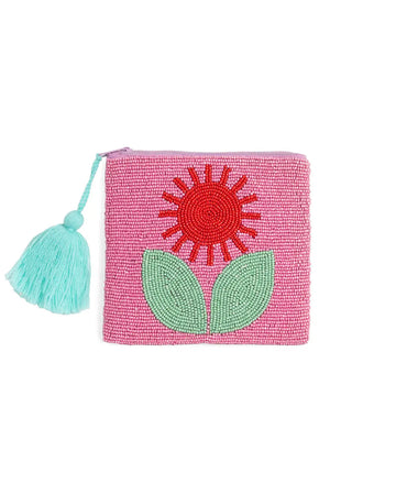small beaded pink clutch with red and green beaded flower and teal tassel