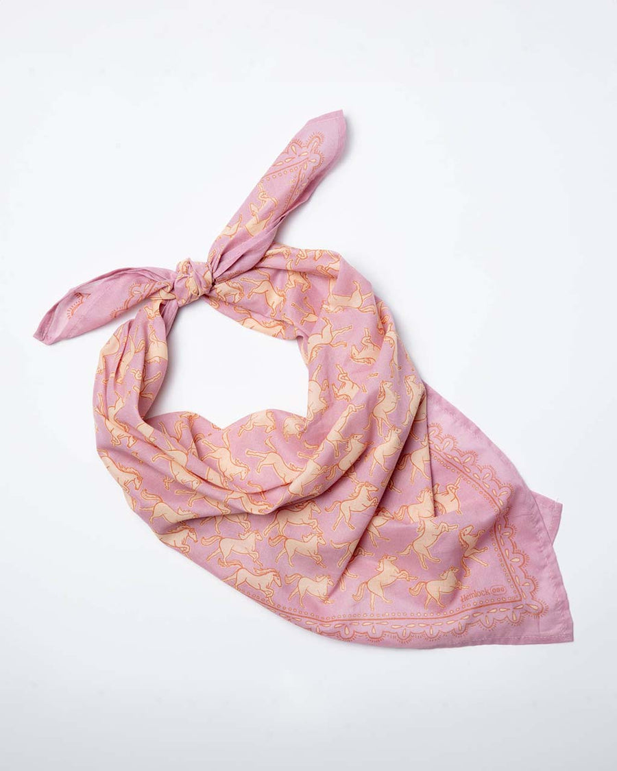folded pink 34 in. x 34 in. bandana with all over horse print