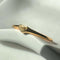 side view of gold mini heart signet ring