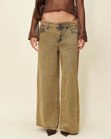 model wearing sandblasted wide leg denim jeans