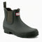 front view of short green rubber rain boots with tonal elastic on the sides and hunter logo on the front