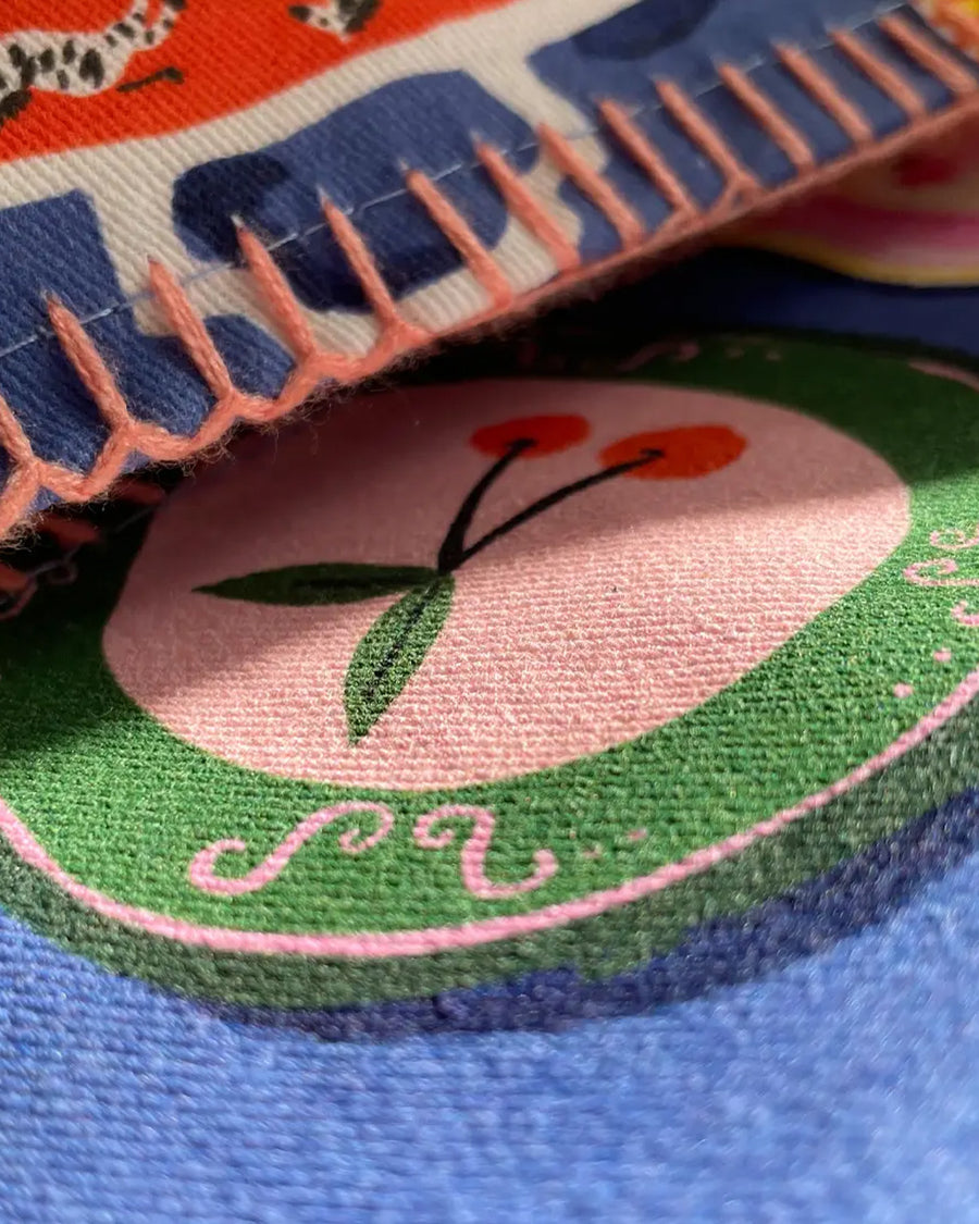 up close of pink embroidered trim