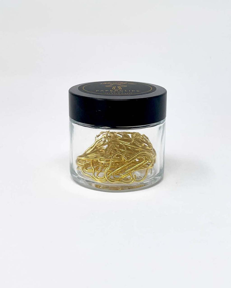 packaged set of 25 gold mushroom shaped paper clips