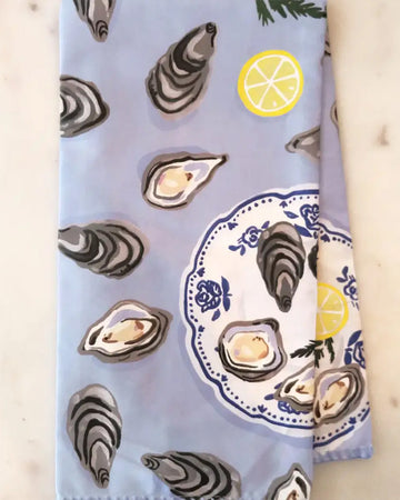 periwinkle cotton tea towel with oysters and plate print