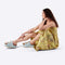model wearing light denim platform slide sandal with brass buckles