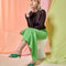 model wearing kelly green plissee kitten heels