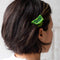 model wearing mini lime shaped hair claw