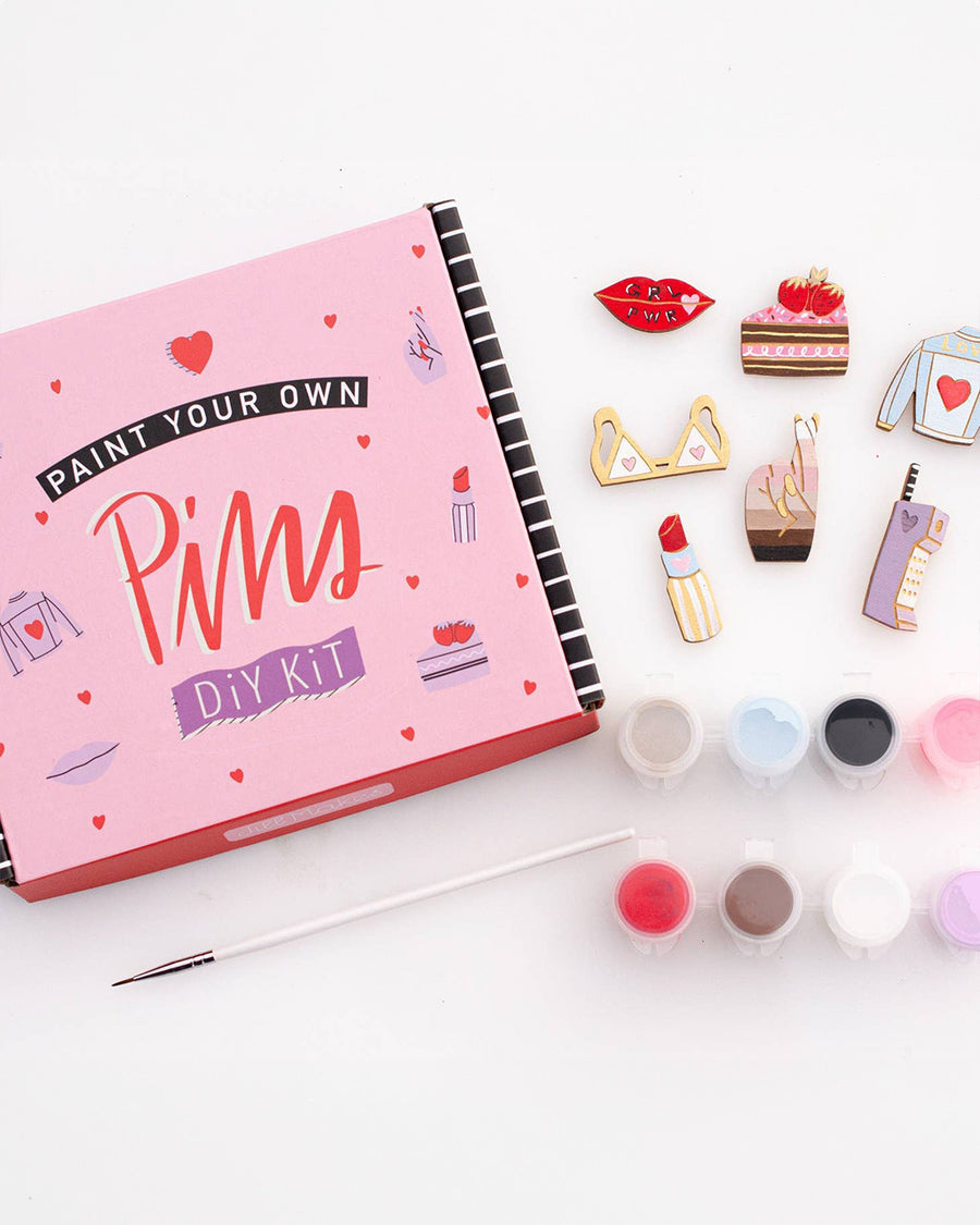 paint your own pins kit: paint, brushes, and 7 pins to be painted