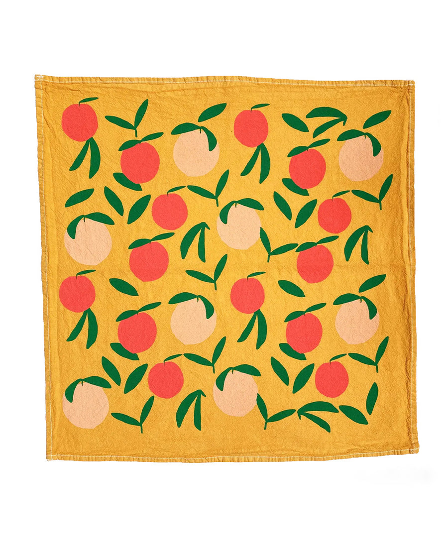 yellow cotton tea towel with all over peach print