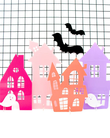 set of four acrylic haunted houses decor in hot pink, light pink, coral and lavender with bats and ghosts