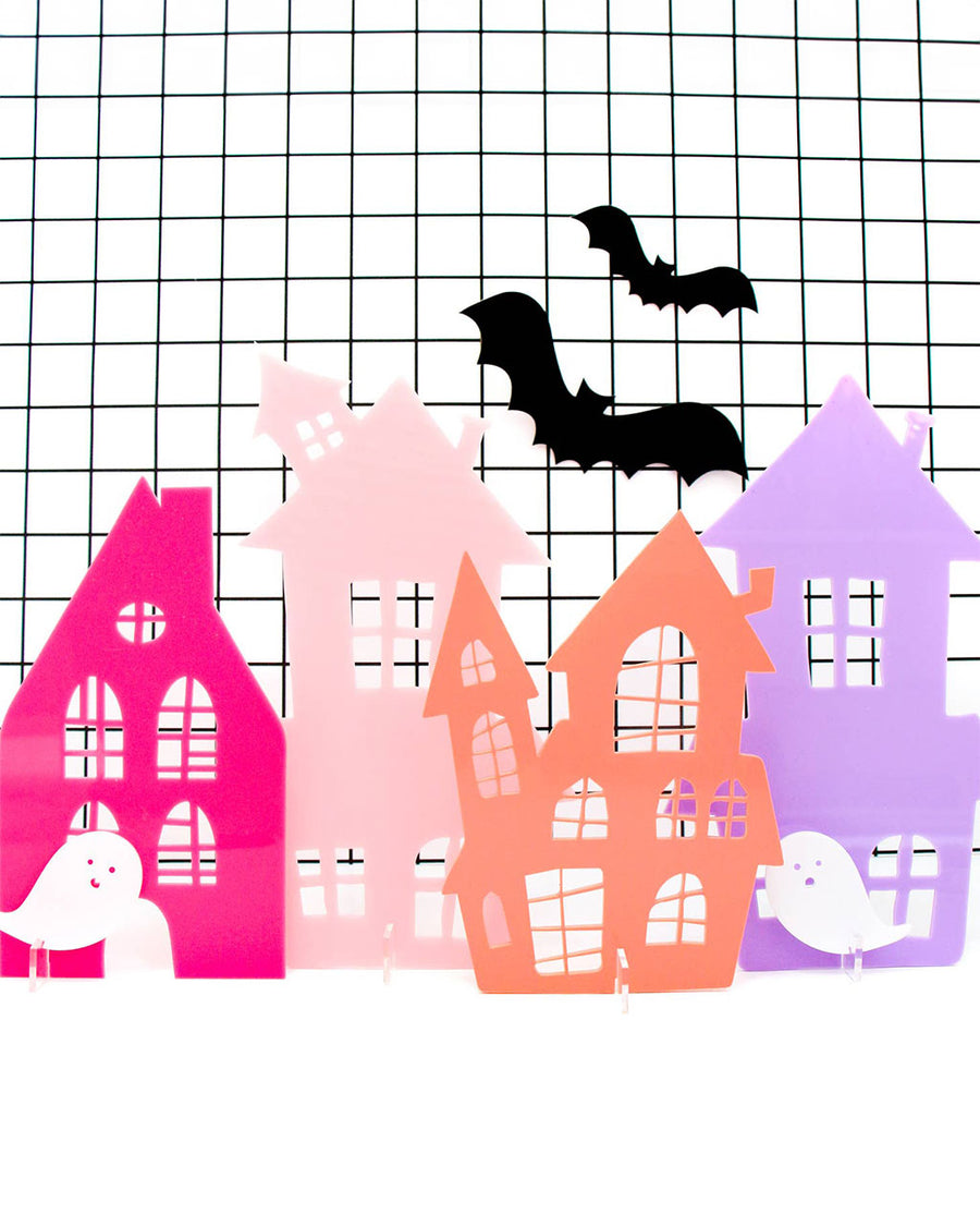 set of four acrylic haunted houses decor in hot pink, light pink, coral and lavender with bats and ghosts