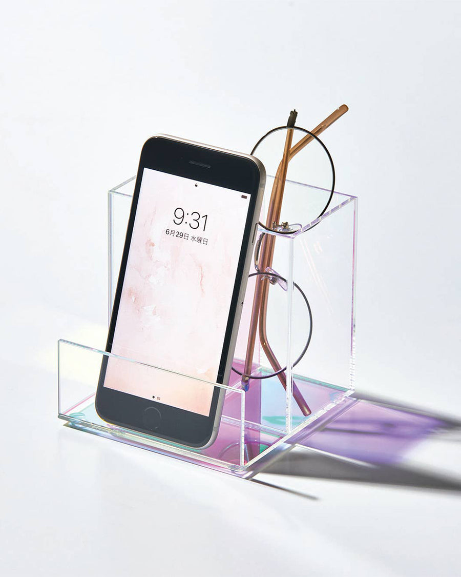 iridescent pen and phone holder with glasses and pencil inside