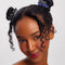 model wearing 5 satin midnight blue thin hair scrunchies in their hair