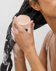 model using rice protein shampoo bar