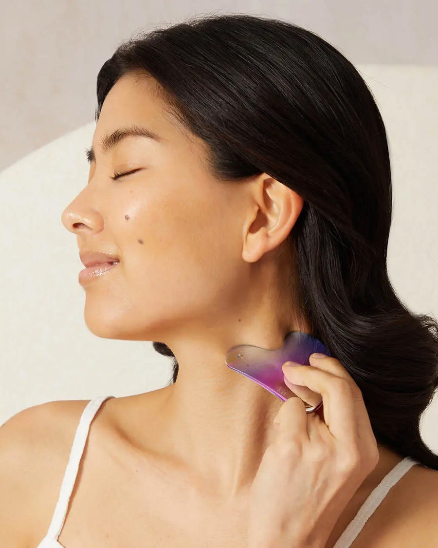 side view of Iridescent stainless steel gua sha