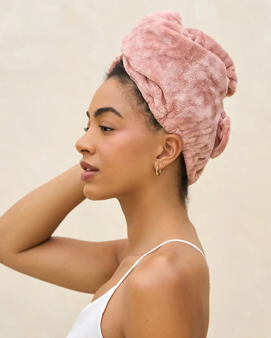 side view of model wearing Terracotta Plush Microfiber Hair Towel
