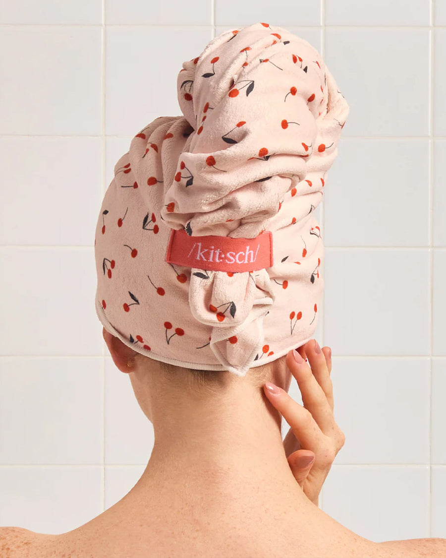 back view of light pink large absorbent XL hair towel with all over cherry print