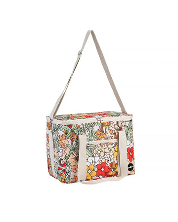 picnic bag with colorful floral print, cream straps and zipper front pocket