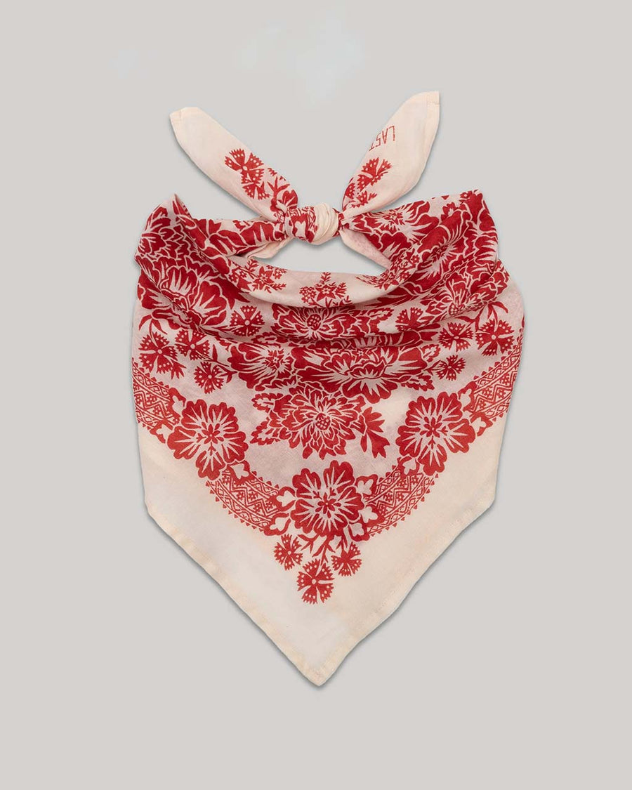 sand 22 in. x 22 in. square  with red floral print folded and knotted