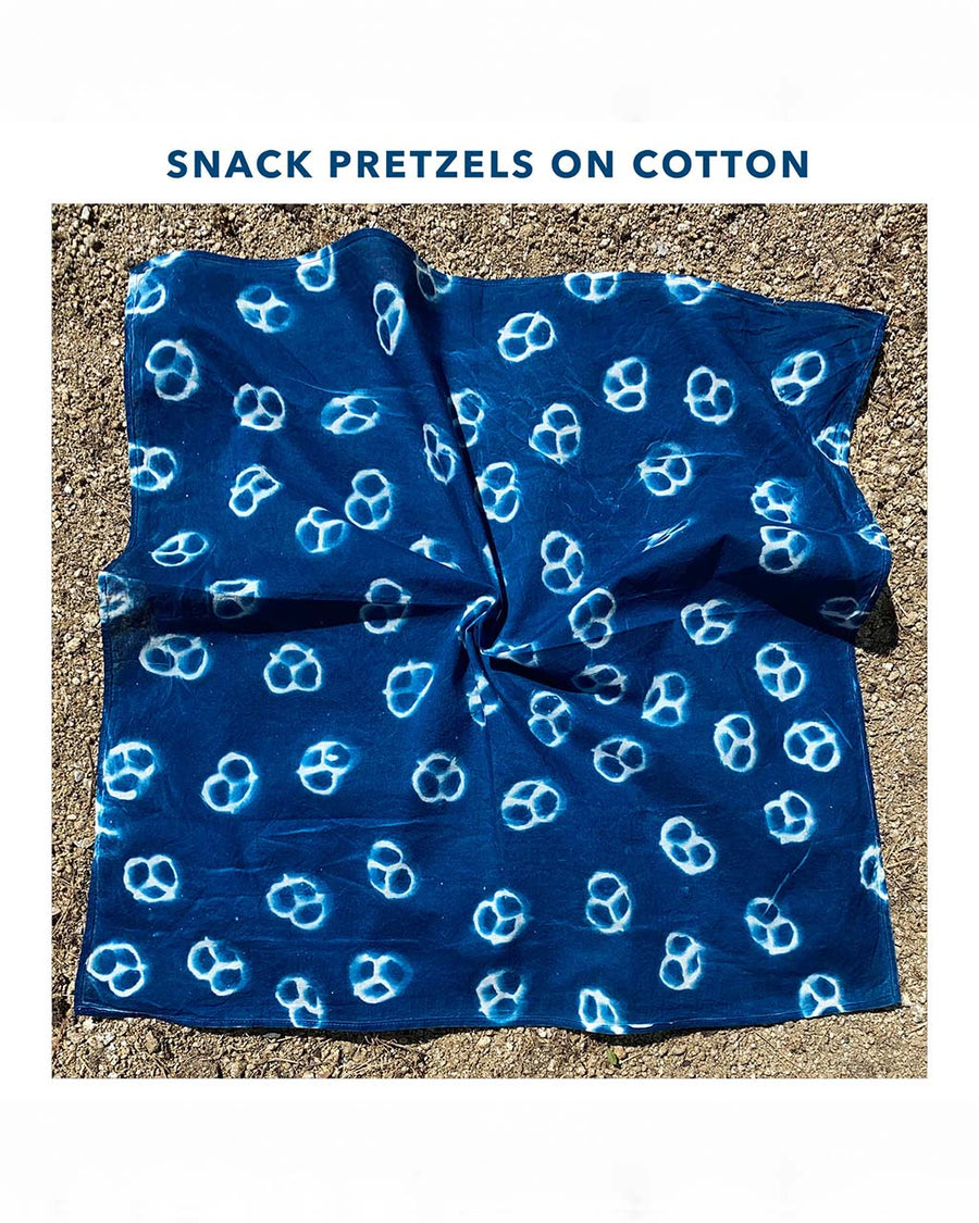 snack pretzels on cotton bandana