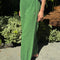 side view of model wearing asparagus balloon pants