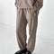 model wearing mushroom brown balloon pants and matching top