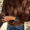 model wearing dark brown mohair crew neck sweater