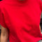 model wearing red relaxed fit tee