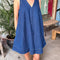 model wearing blue denim mini dress