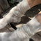 up close of model wearing cream mohair crew socks