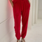 model wearing red apple pointelle jogger pants