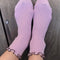 model wearing lilac socks with brown ruffle trim
