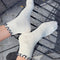 model wearing white socks with navy ruffle trim