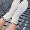 model wearing white socks with navy ruffle trim